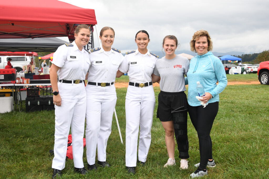 Cadets pose with their friends and family.