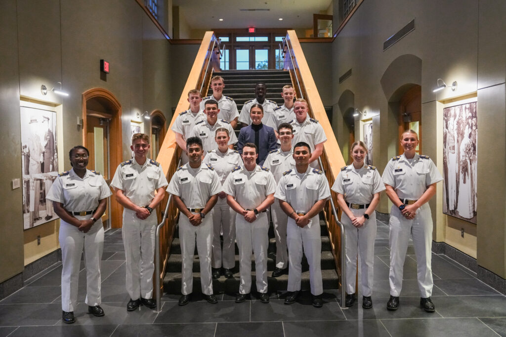 Cadets stand in front of main staircase in Marshall Hall, home of the Center for Leadership and Ethics.