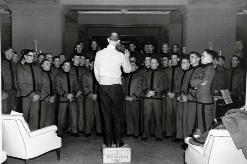 Herbert N. Dillard rehearses with the VMI Glee Club in Washington, D.C. before their Presidential Concert, 1955. VMI Archives.