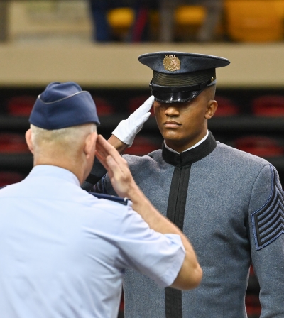 Devin Auzenne salutes during Matriculation Day.