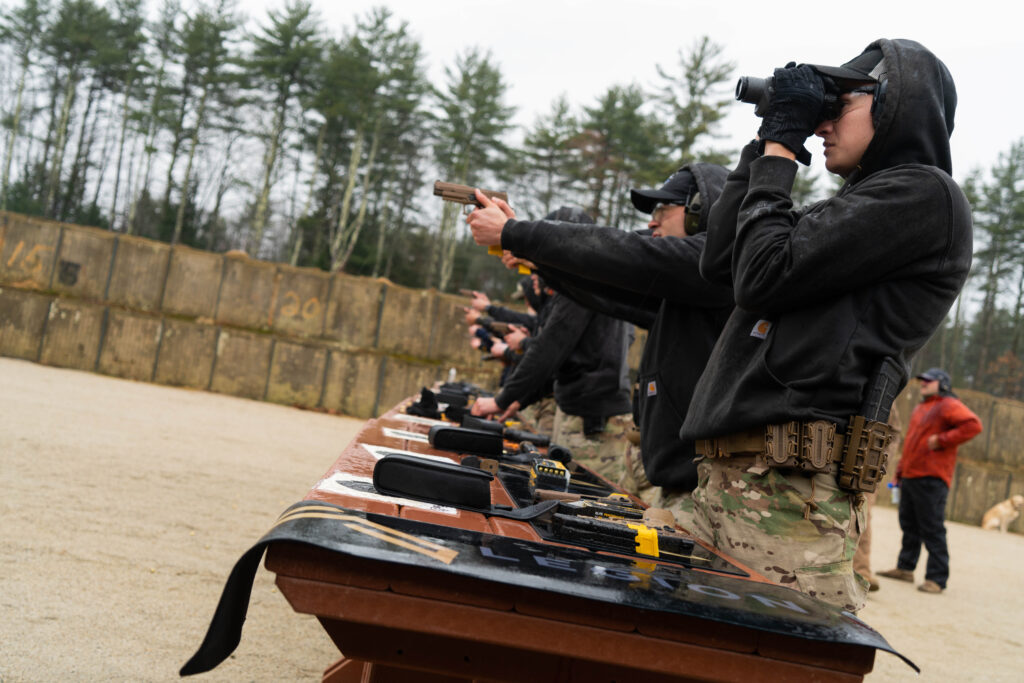 The VMI combat shooting club team shoots at the range.