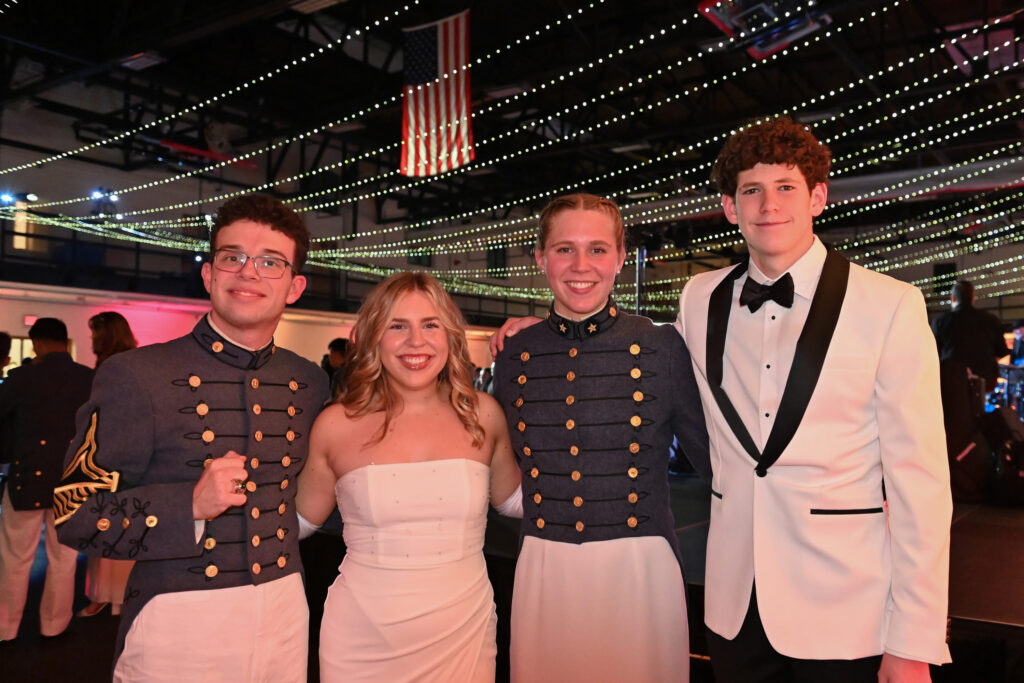 Cadets show off their rings with their dates at the Ring Figure dance.