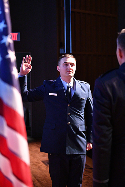 Michael Ferrara takes his oath during his Air Force Pin-On Ceremony.