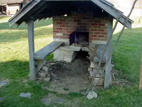 Brick and stone outdoor oven.