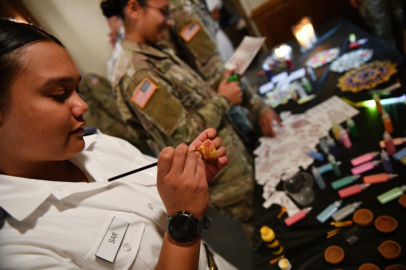 Cadets participate in a craft during Diwali celebrations.