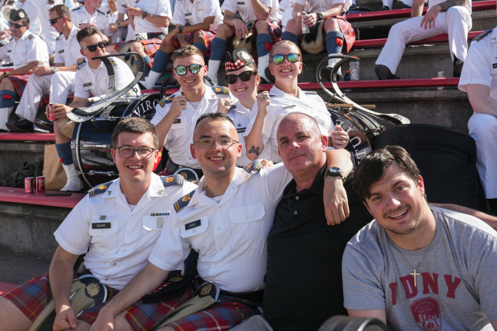 Cadets pose with their family members during family weekend.
