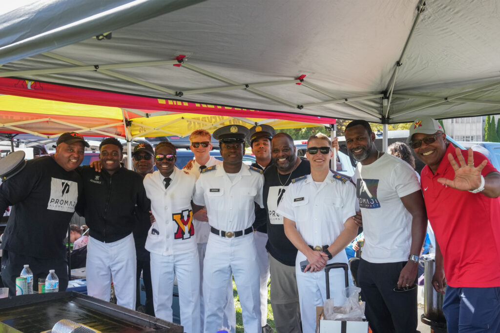 Cadets pose with their family members during family weekend.